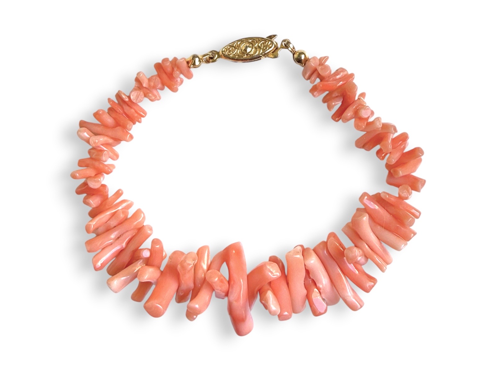 A Bracelet Of Italian Frangia Coral Small, Graduated Length Orange Branches.