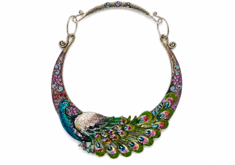 A Silvered Metal Curved Tapered Band Necklace Of A Multicoloured Painted Peacock.