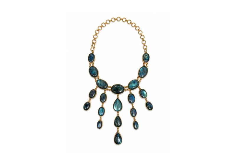 A Gold Plated Chain Necklace With Twenty Linked Madagascan Labradorite Domed Oval Cabochons, Each Set in A Gold Plated Frame.