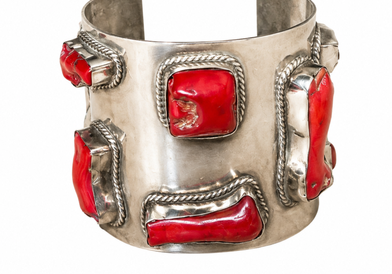 A Silvered Metal Open Cuff With Eight Red Dyed Sea Bamboo Coral Branches, Each Set In A Raised Silvered Metal Frame.