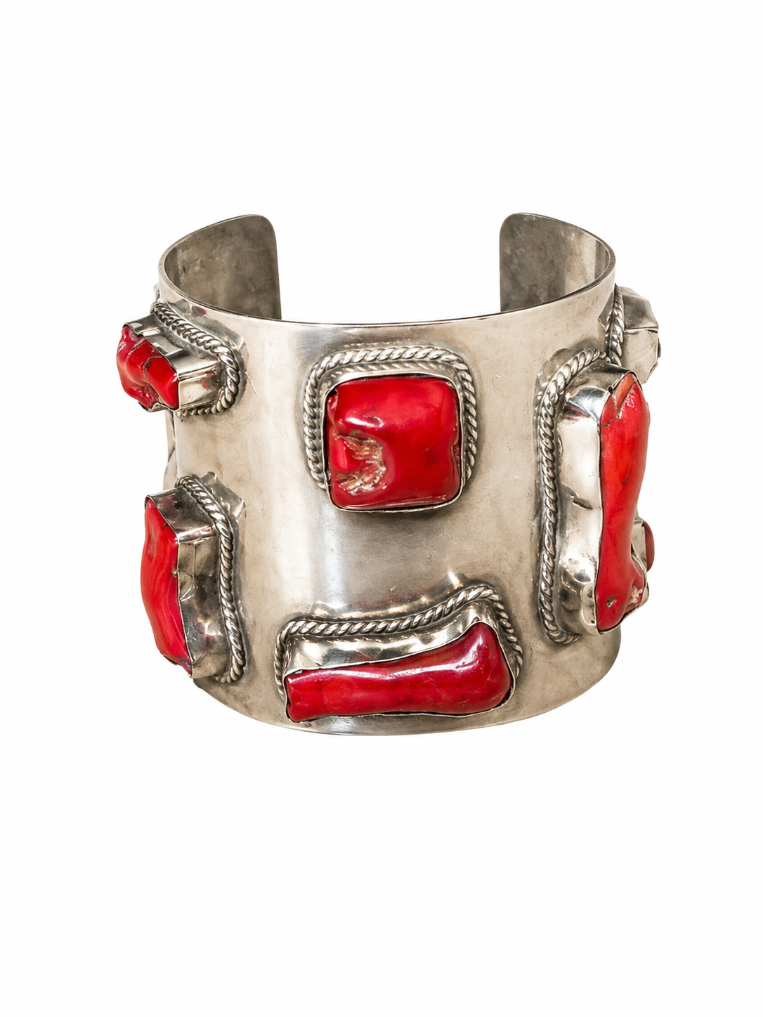 A Silvered Metal Open Cuff With Eight Red Dyed Sea Bamboo Coral Branches, Each Set In A Raised Silvered Metal Frame.