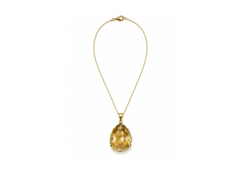 A Large Lemon Quartz Domed Facetted Teardrop Shaped Pendant Set In A Gold Plated Frame, On A Gold Plated Chain Necklace.