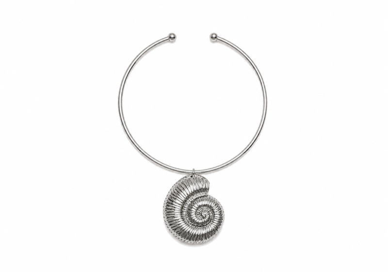 A Silvered Metal Circular Open Band Necklace With A Silvered Metal Striped Coiled Hollow Band Shell Pendant.