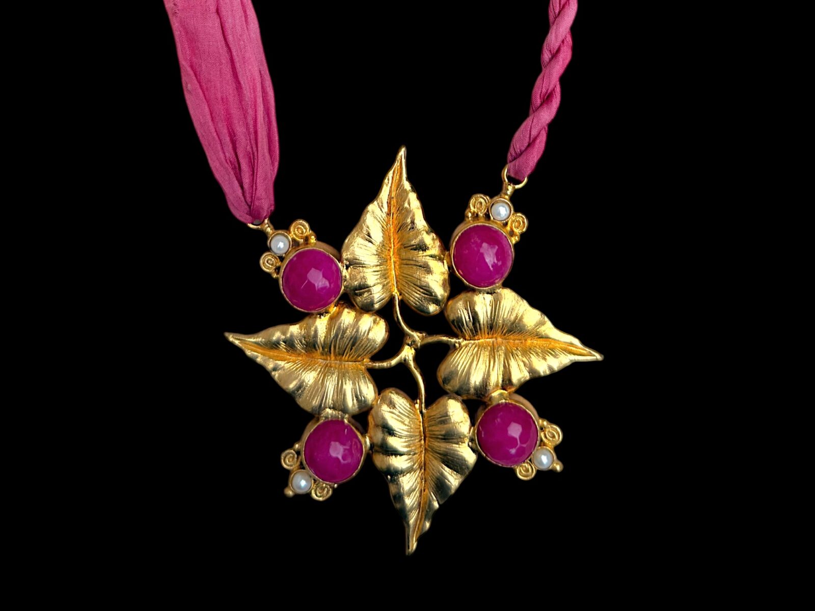 A long Necklace Of Two Pink Silk Strands, With A Gold Plated Four Leaves Pendant, Inlaid With Pink Dyed Domed Circular Facetted Agates, And Small Round White Freshwater Pearls. - Image 3
