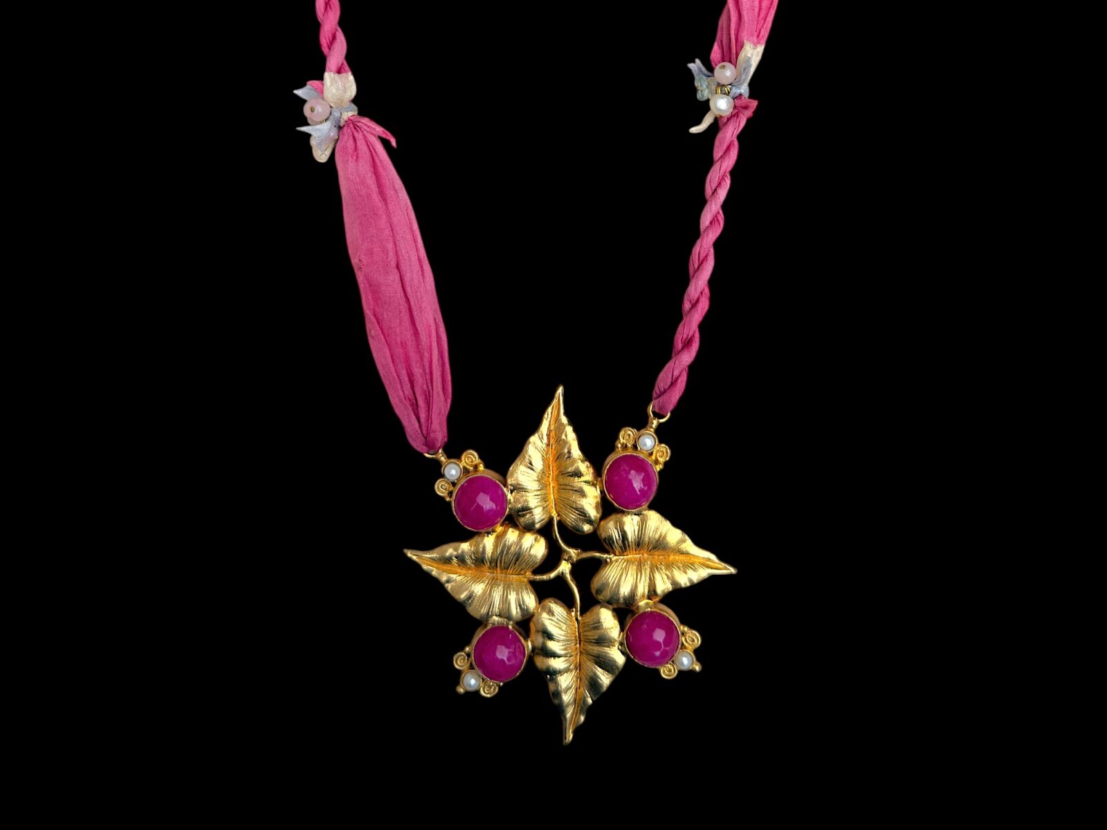A long Necklace Of Two Pink Silk Strands, With A Gold Plated Four Leaves Pendant, Inlaid With Pink Dyed Domed Circular Facetted Agates, And Small Round White Freshwater Pearls. - Image 2