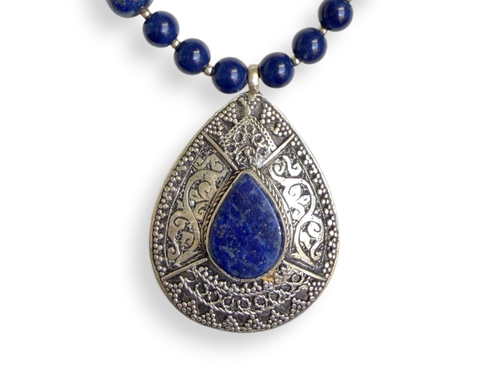 An Afghan Necklace Of Lapis Lazuli Round Beads And Small Silver Plated Round Spacers, Lapis Beaded Necklace With An Afghan Silver Plated Patterned Teardrop Shaped Pendant With A Lapis Lazuli Teardrop Shaped Cabochon. - Image 2