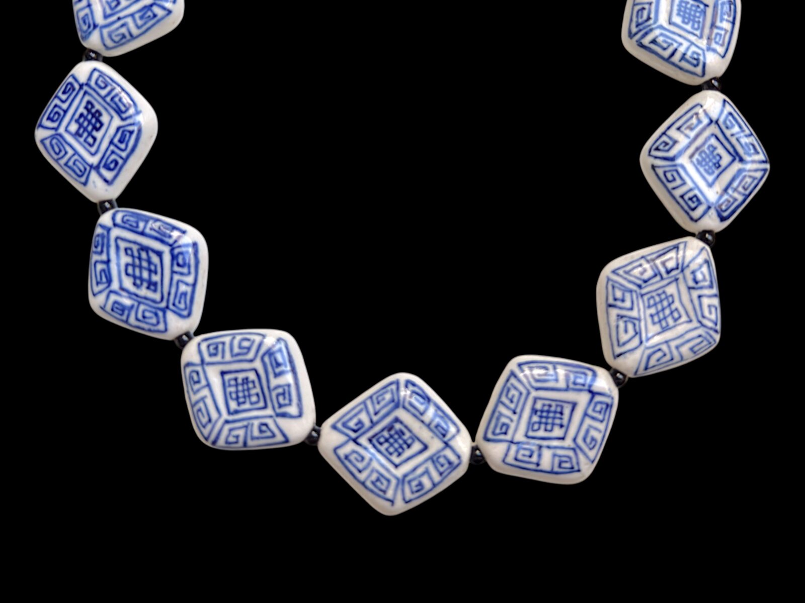 A Necklace Of Eleven Blue And White Patterned Porcelain Diamond Shaped Beads With Black Onyx Round Beads And Spacers. - Image 2