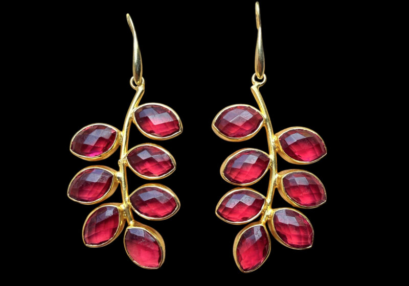 A Pair Of Gold Plated Earrings, Each With Seven 'Leaves' Of Red Facetted Glass Pointed Oval Inlays.