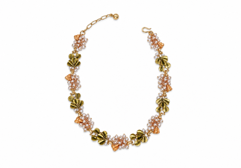 A Golden Metal Necklace of Green And Orange Enamel Painted 'Leaves' And Small White Round Glass 'Faux Pearls'.