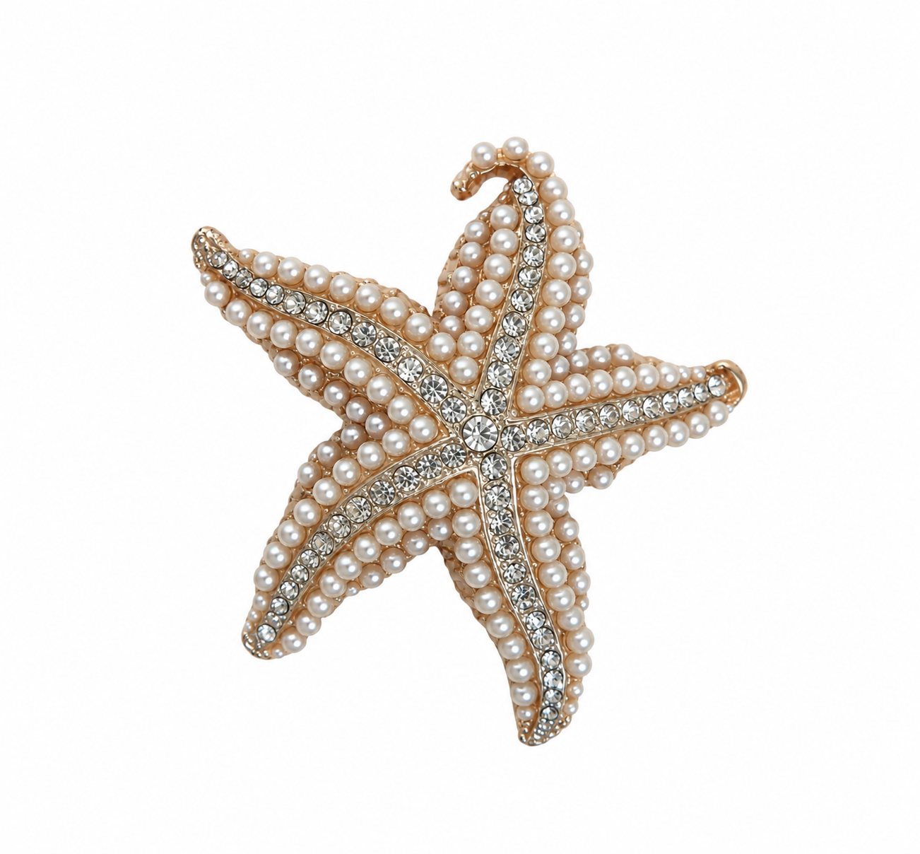 A Golden metal brooch of a starfish inlaid with round white glass "faux pearls" and clear faceted cabochons.