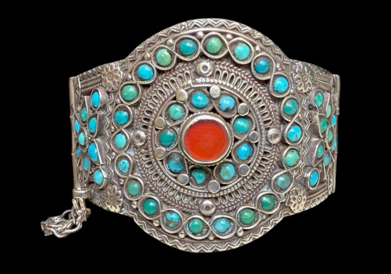 Antique Tibetan Silver Hinged Cuff Inlaid With Small Turquoise Cabochons A Central Circular Raised Carnelian Cabochon