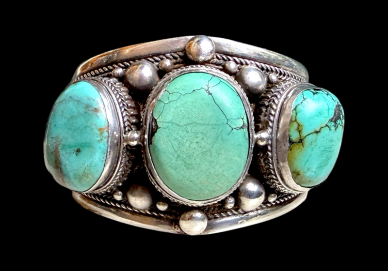 An Antique Afghan Sterling Silver Open Cuff Inlaid With Three Large And Two Smaller Turquoise Oval Cabochons