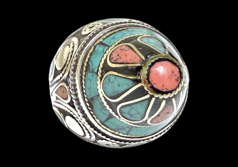 A Large Antique Afghan Patterned Silver Pointed Ring Inlaid With Small Turquoise And Coral Slices